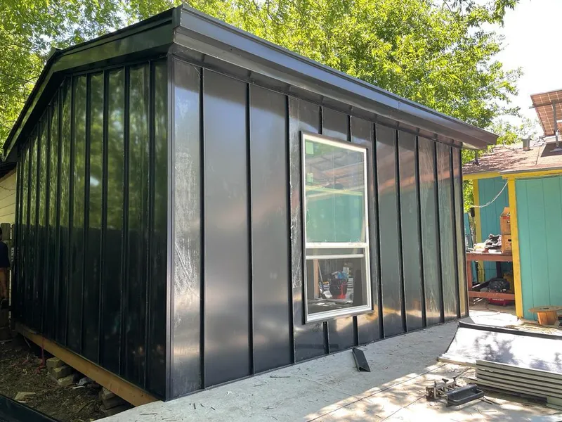 Black standing seam metal wall panels for Roof Inspection in West Columbia